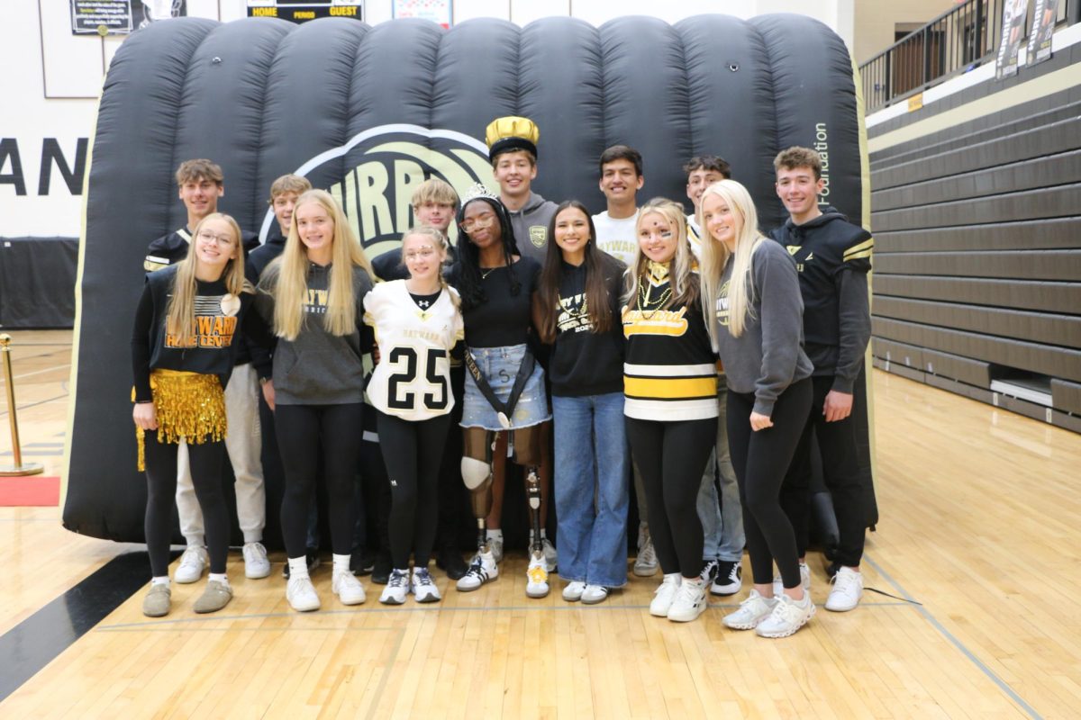 L-R: Freshmen Simon Hansen and Lainey Duffy, Sophomores Bob Droessler and Alivia Beckwith, Juniors Viktor Enk and Dani Mattson, King Wyatt Lobitz and Queen Yannah Anglin, Seniors Bradley Young and Julia Pettibone, Guy Swenson and Sierra Stojek, Kyle Gajewski and Rachel Miller. 