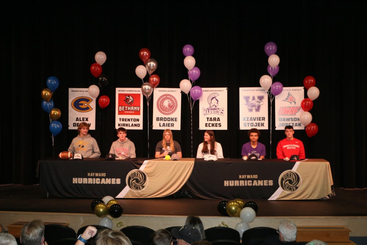 College Signing Day
L-R: Alex DePew,  Trenton Kirkland, Brooke Laier, Tara Eckes, Xzavier Stojek and Dawson Jorczak.