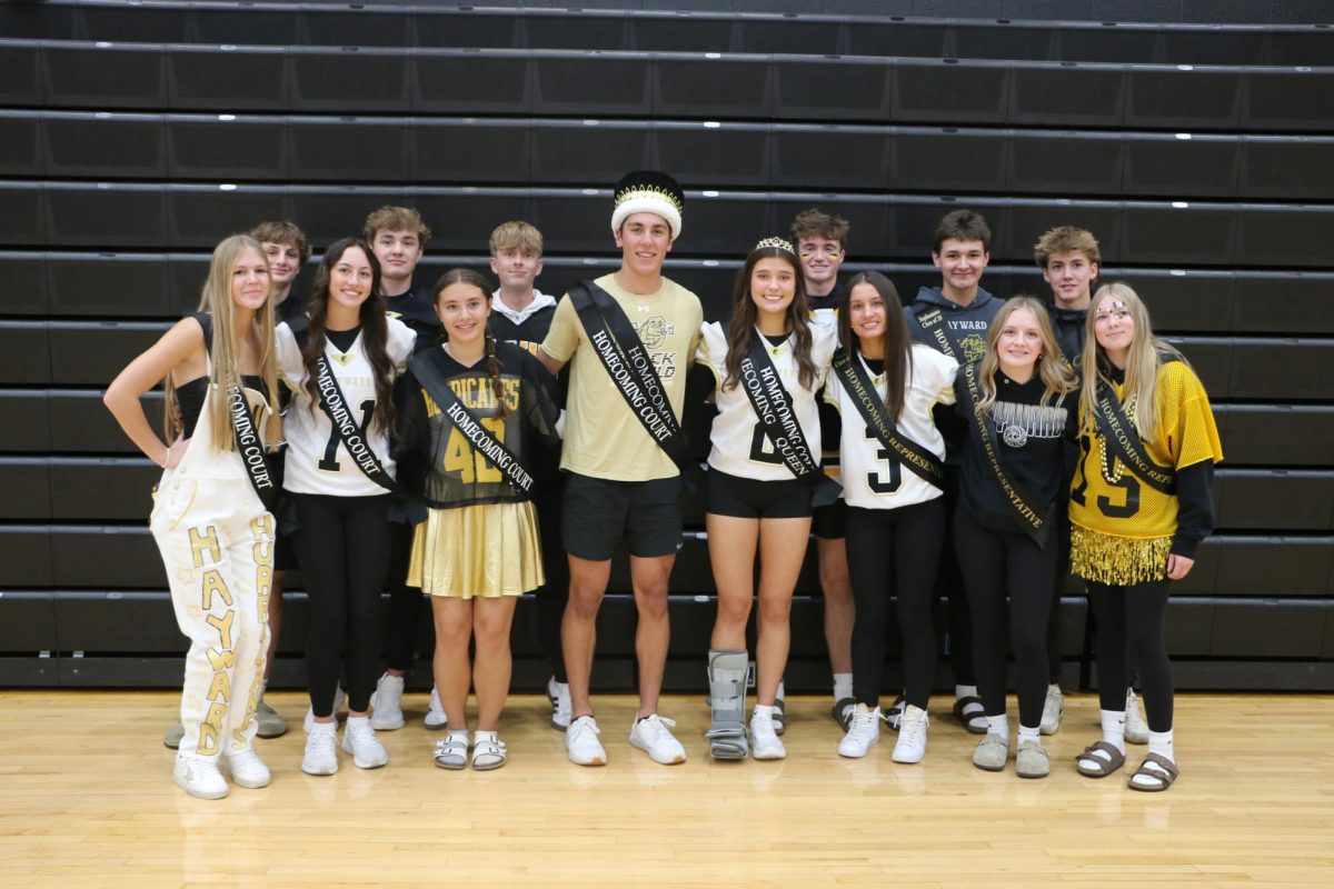 L-R: Senior attendants Liesel Kuehl, Eric Fish, Charley Christian, Jacob Schuck, Emma Blinkwolt, Viktor Enk, King Lucas Hansen, Queen Makenna Hutchison, Junior attendants Rocco Goold, Danika Kortendick, Sophomore attends William Johnson, Abby Carson, Freshman attendants Locklan Sheehan and Kaydence Poplin.